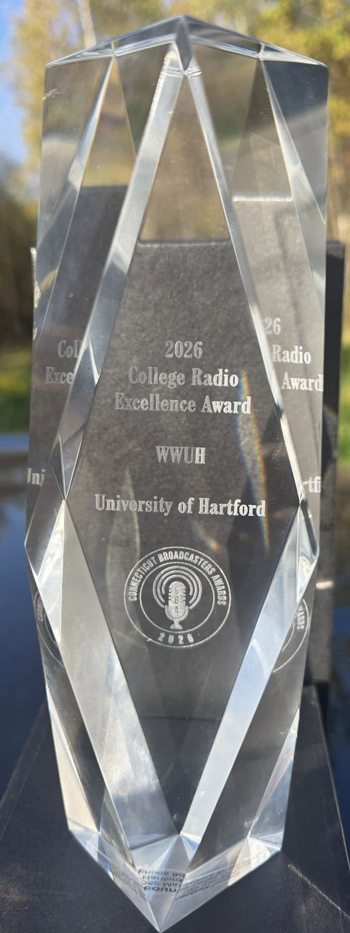 photo of award presented to WWUH for College Radio Excellence