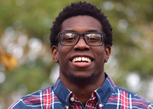 Portrait image of mechanical engineering student smiling.