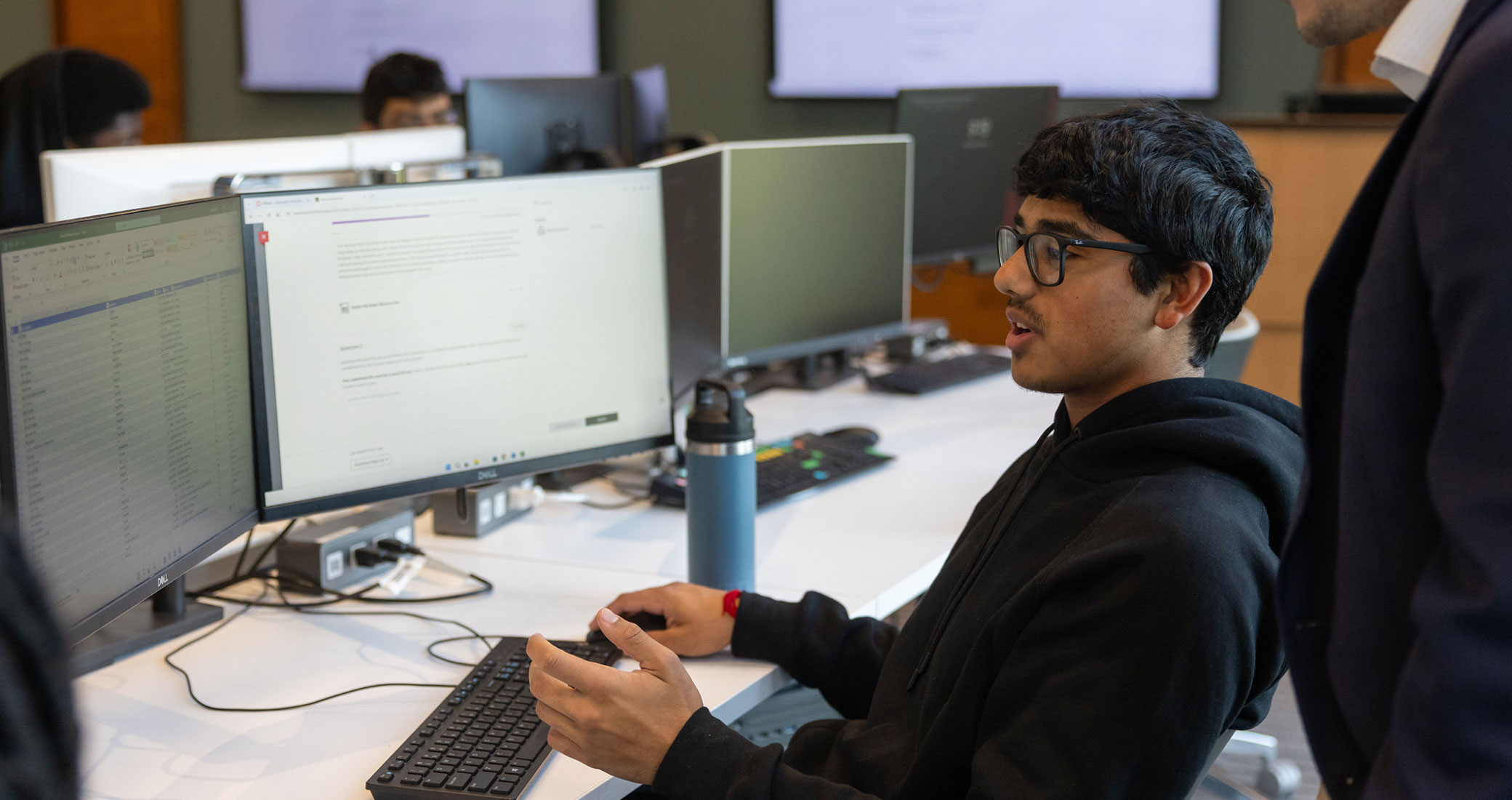 Barney students working in the Trading Room