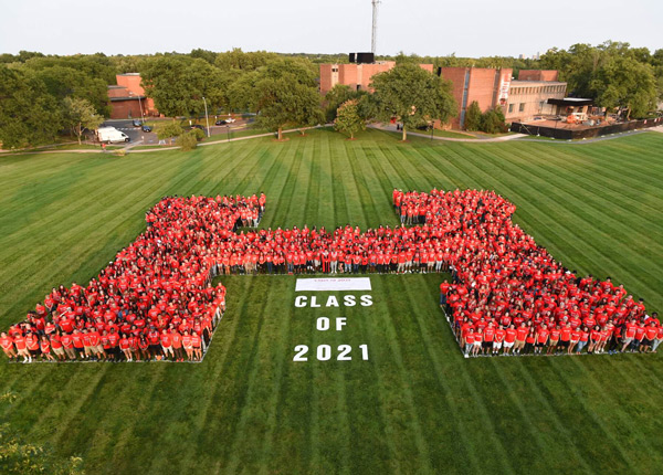 New students form a massive “H” on the campus green