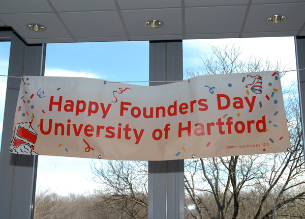 Happy Founders Day banner across windows