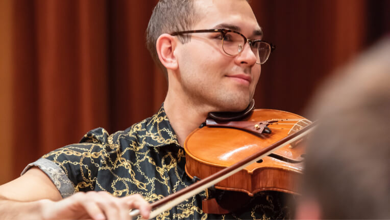 Student playing violin