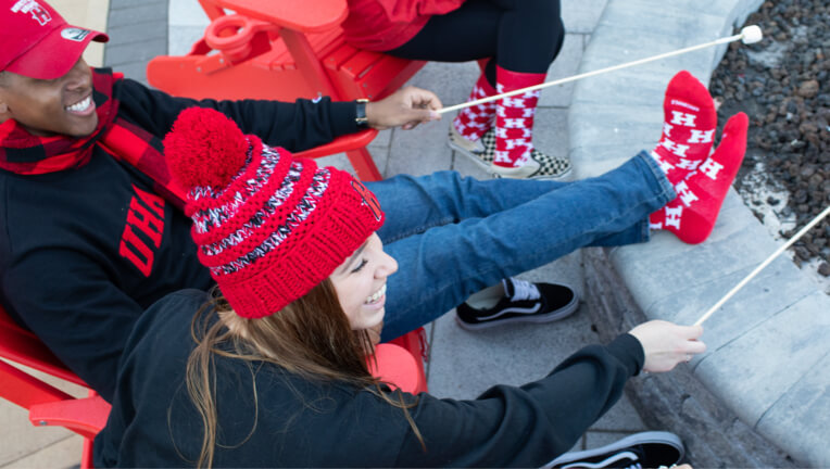 Students roasting marshmellows