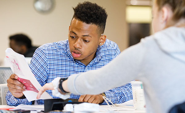 Students working together inside classroom
