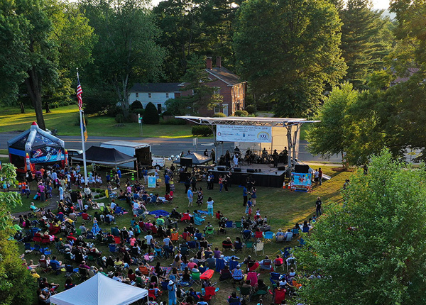 Five person outdoor concert performance