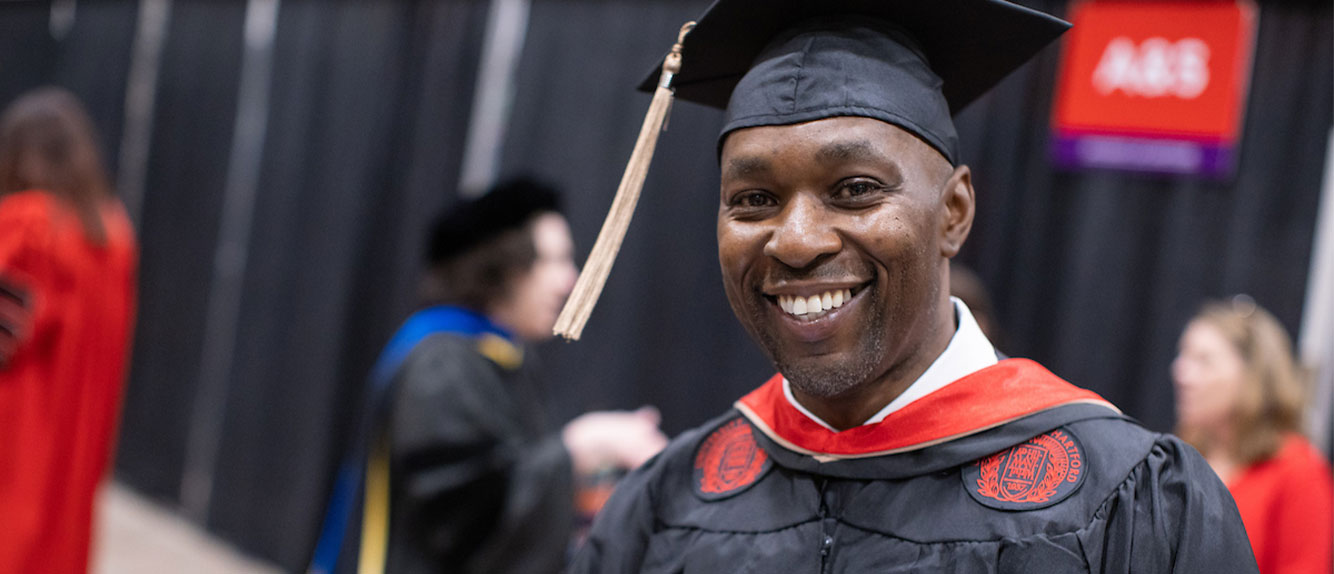 UHart adult student at Commencement