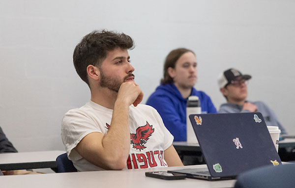 student listening in classroom
