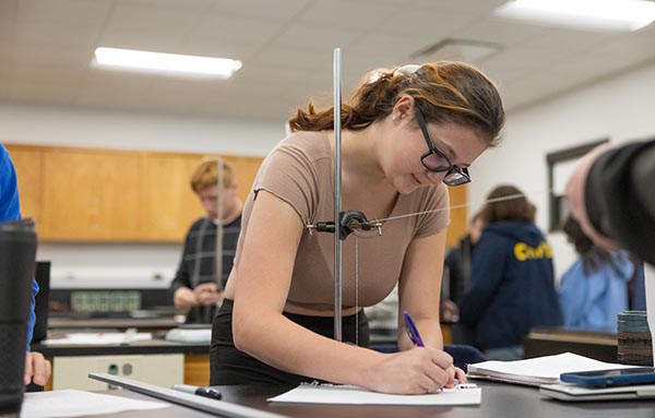 Students working in Physics lab. 