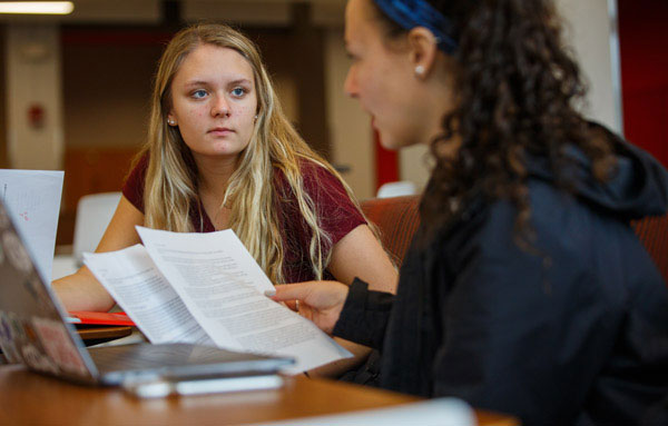 Students working at computer. 