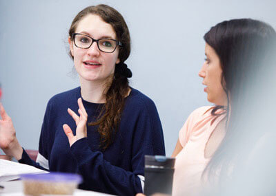 Student speaking in classroom.