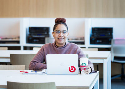 Student with Laptop Computer 