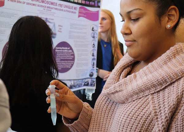 Student conducting experiment.