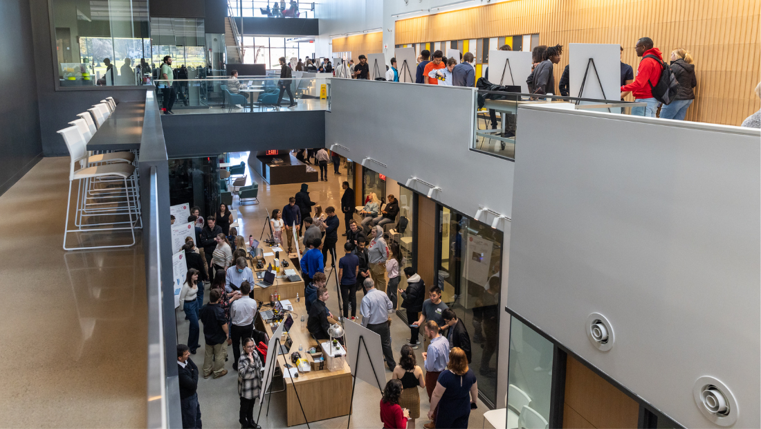 University engineering center filled with expo students.