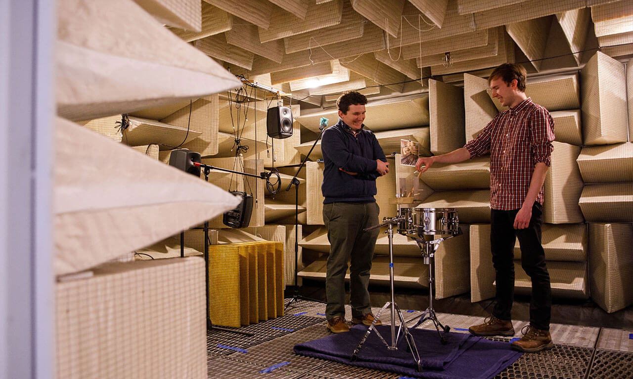professor and student in sound room