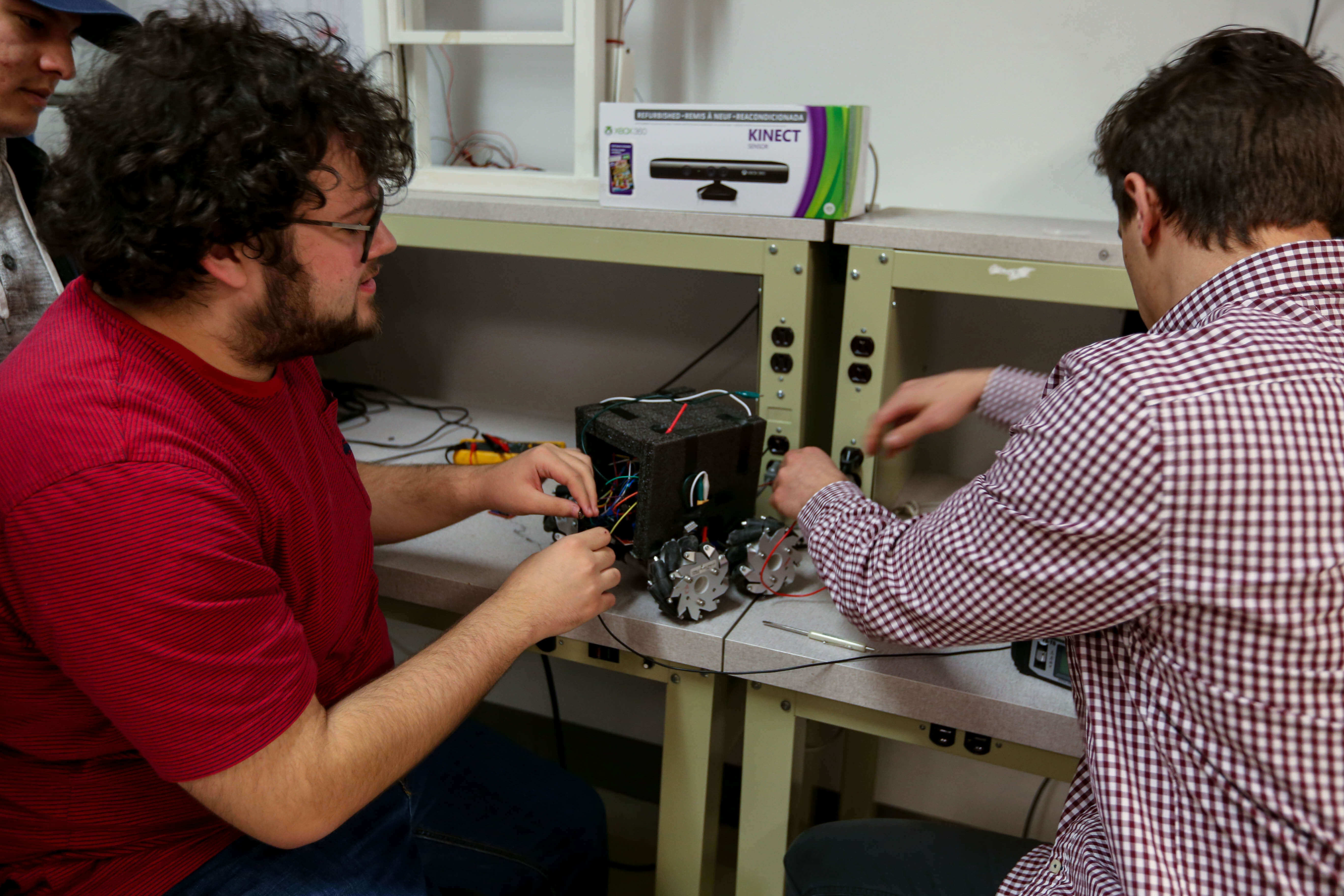 students working on robot