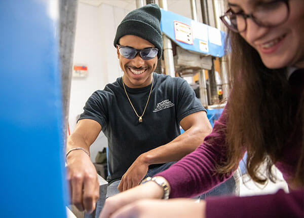 student and faculty working together