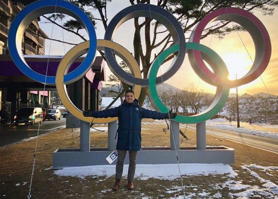 Student working at Olympics