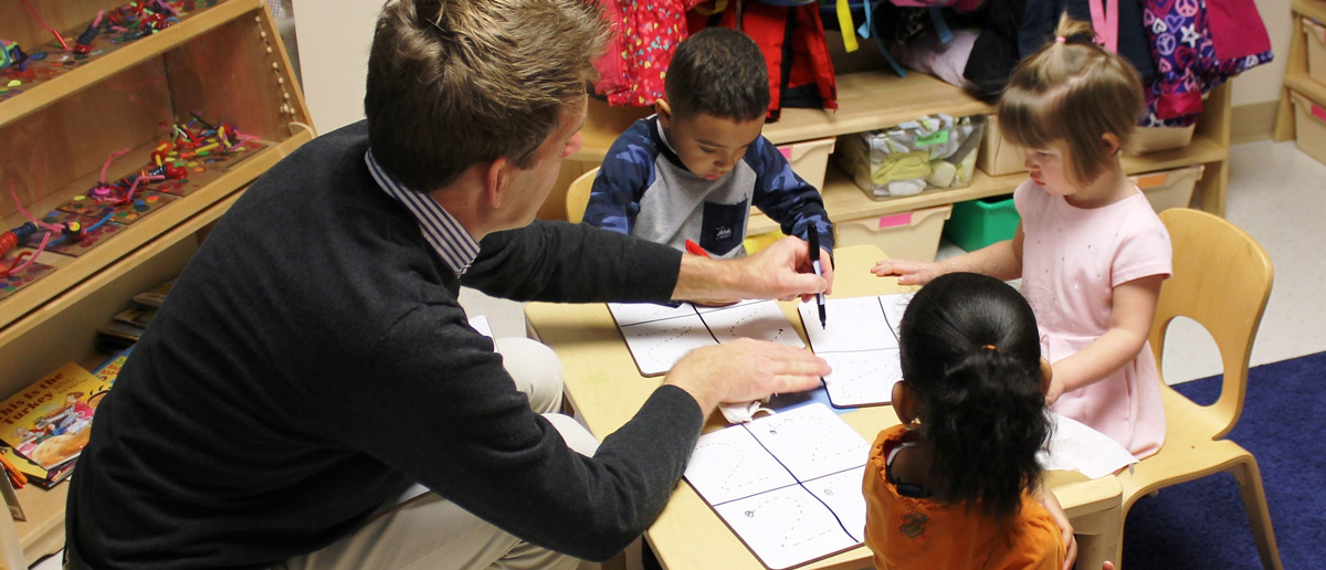 Teacher with preschool students