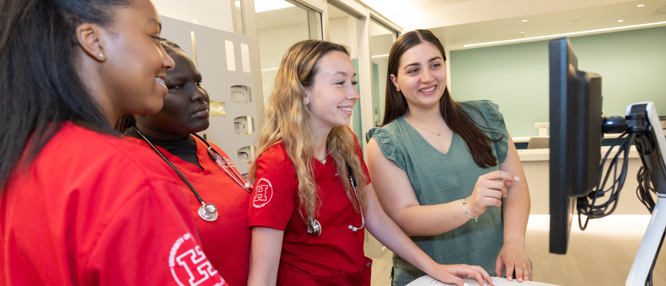 MSN nursing students practicing hands-on learning in state-of-the-art nursing sim labs at the University of Hartford 
