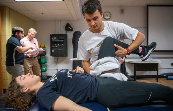 physical therapy students in lab
