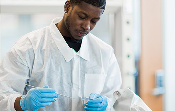 BS health sciences student in lab