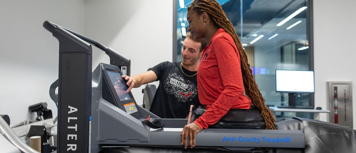 Exercise science students using treadmill