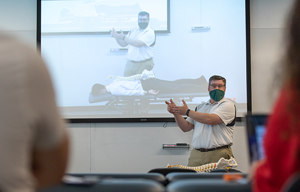 physical therapy instructor in lecture