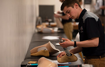 prosthetics student in lab