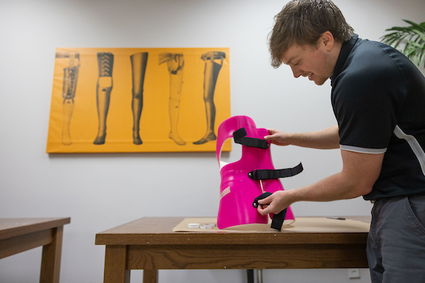 prosthetics student in lab