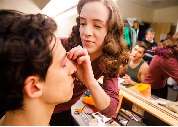 Students working in the Theater