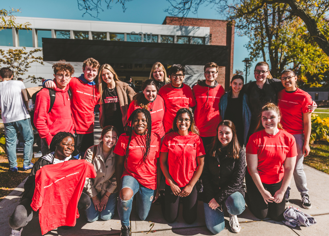 image is of a group of students wearing UHart t-shirts