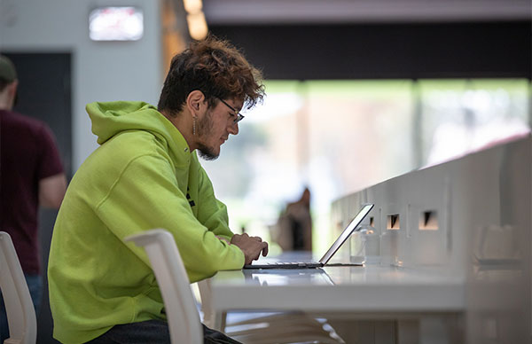 student working on computer