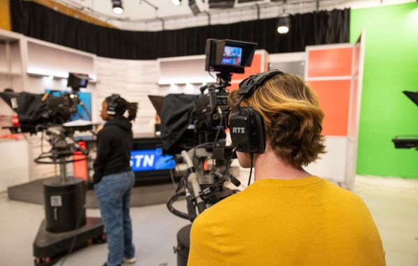 STN2 students filming a live broadcast in UHart's TV studio.