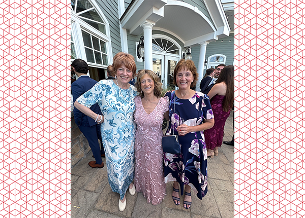 Lee Ann, Ruth, and Robin posing at a wedding