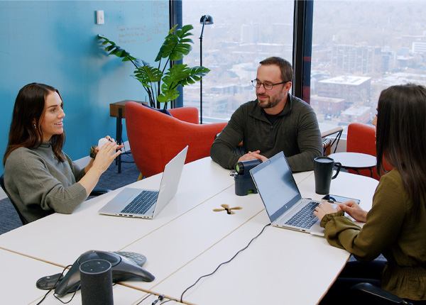 grad students having a meeting in office