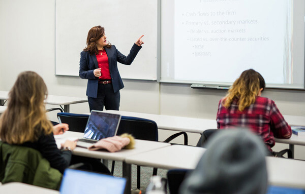 Barney professor talking to the class