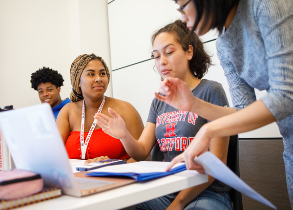 Barney finance students listen to a lecture in class