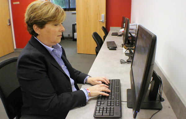 Graduate student working on a computer