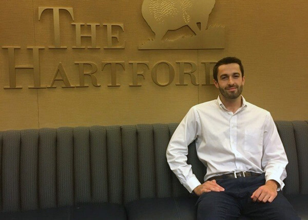 A Barney student at his internship at the Hartford.