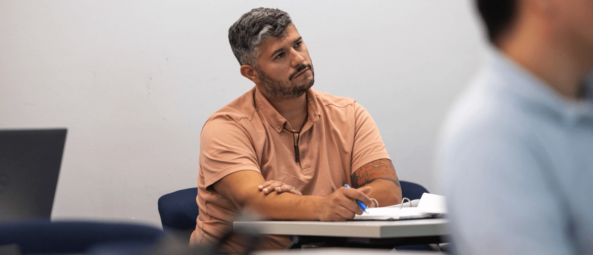 Student in a Barney graduate classroom