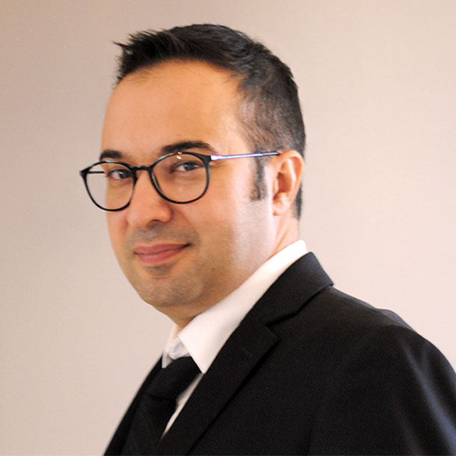 Reza Assasi headshot