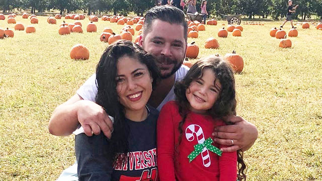 Nicole Pielli '12 with family