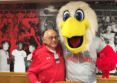 Rosen Society member with Howie the Hawk