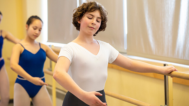 Students at the ballet barre.