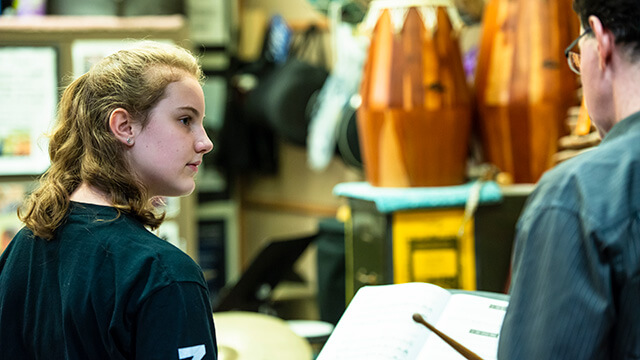 Percussion faculty member Ben Toth working with a student.