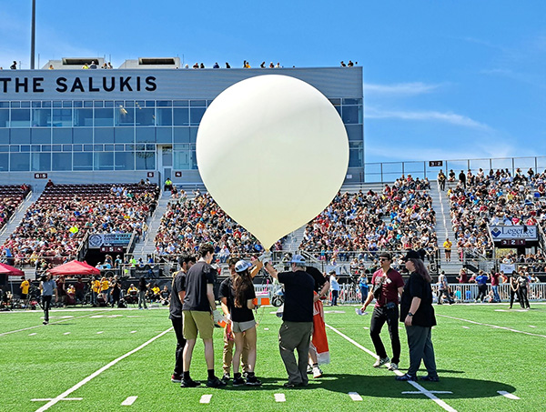UHart CETA students launch eclipse balloon in Carbondale, IL