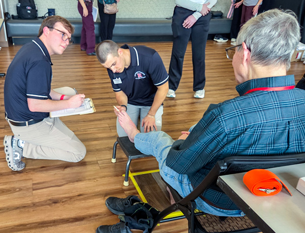 DPT students working with community members