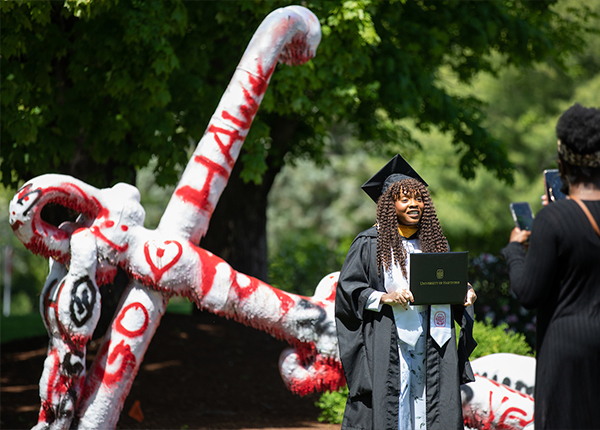 student in front of anchor