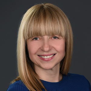 Headshot portrait of Professor Milanovic smiling.