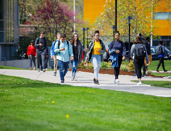 students walking through campus